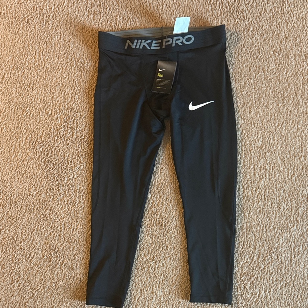 Nike Pro Kids Black Leggings with White Logo